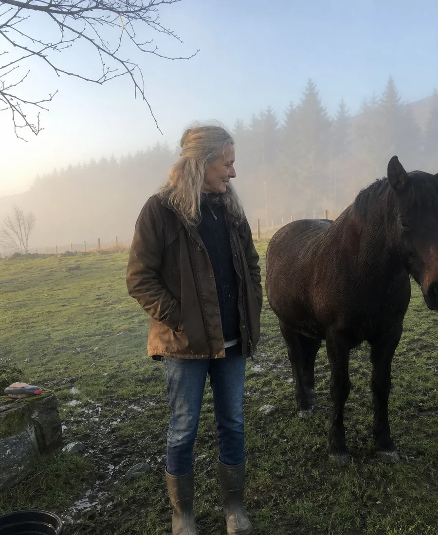 Soo Woods with a horse on the land at Eureka Pines